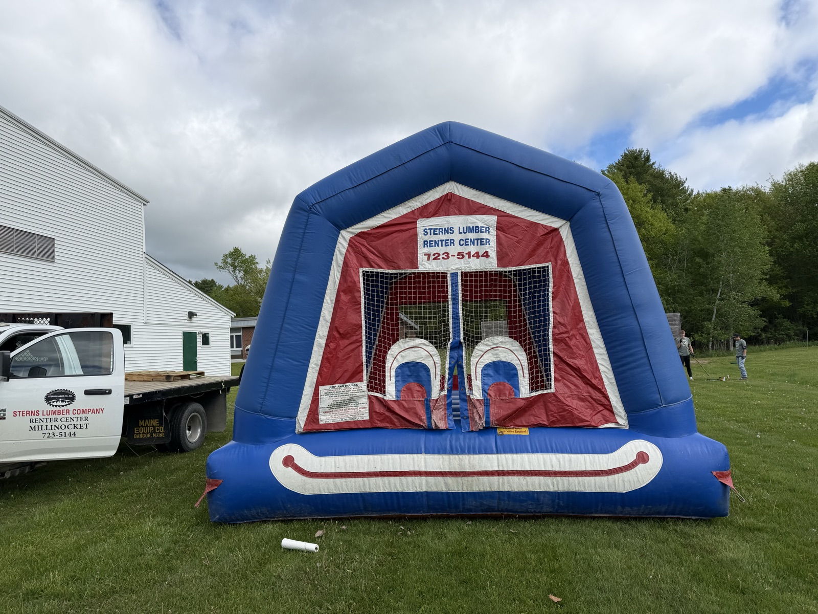 Sterns Lumber Renter Center bounce room set up on a lawn